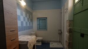 A laundry room with a washing machine, a toilet, and a shower. - Geronymos Stone Villa Pool Chania Apokoronas Crete (Fres)