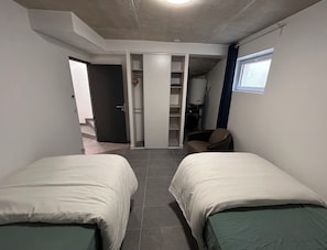 2 dormitorios, caja fuerte, tabla de planchar con plancha y wifi gratis