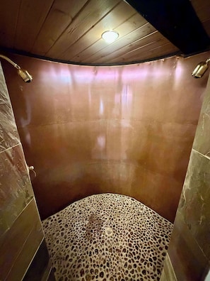 A bathroom with a wooden ceiling, a shower area, and a patterned floor. - Tynecastle Retreat - Views, Game Room & Patio (Banner Elk)