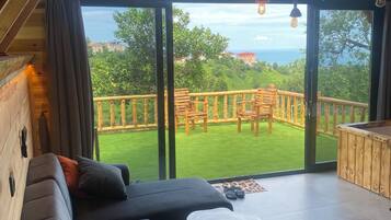 Deluxe Bungalow, Terrace, Sea View | Blackout drapes, iron/ironing board, free WiFi, bed sheets