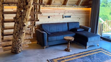 Deluxe-Bungalow, Terrasse, Meerblick | Wohnbereich