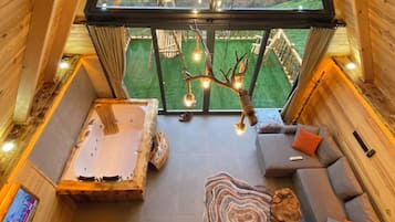 Deluxe Bungalow, Balcony, Sea View | Living area