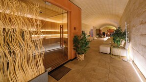 A hotel lobby with a modern design, featuring a wooden wall, a glass partition, and a seating area with a plant. - 24th Floor Sea Front view Apart Hotel Mercury Tower 3 Pools-Cave Spa-Gym-Rooftop (St. Julian's)