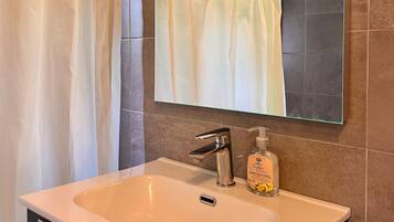 Hair dryer, towels, soap, toilet paper