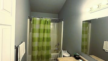 Shower, jetted bath, towels, soap