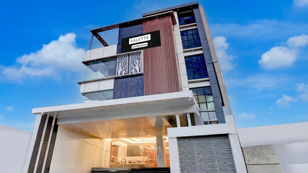 Un edificio moderno con un letrero que dice 'PALETTE'.