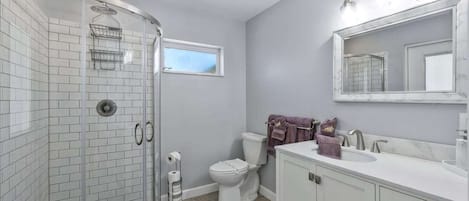 Shower, hair dryer, towels, soap