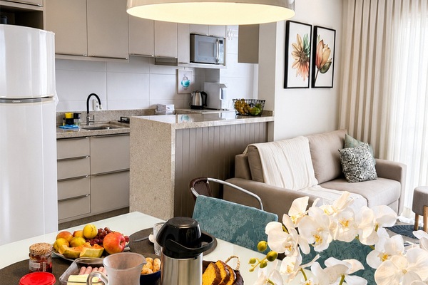 Premium Apartment, Pool Access, Beach View | Private kitchen | Dining table