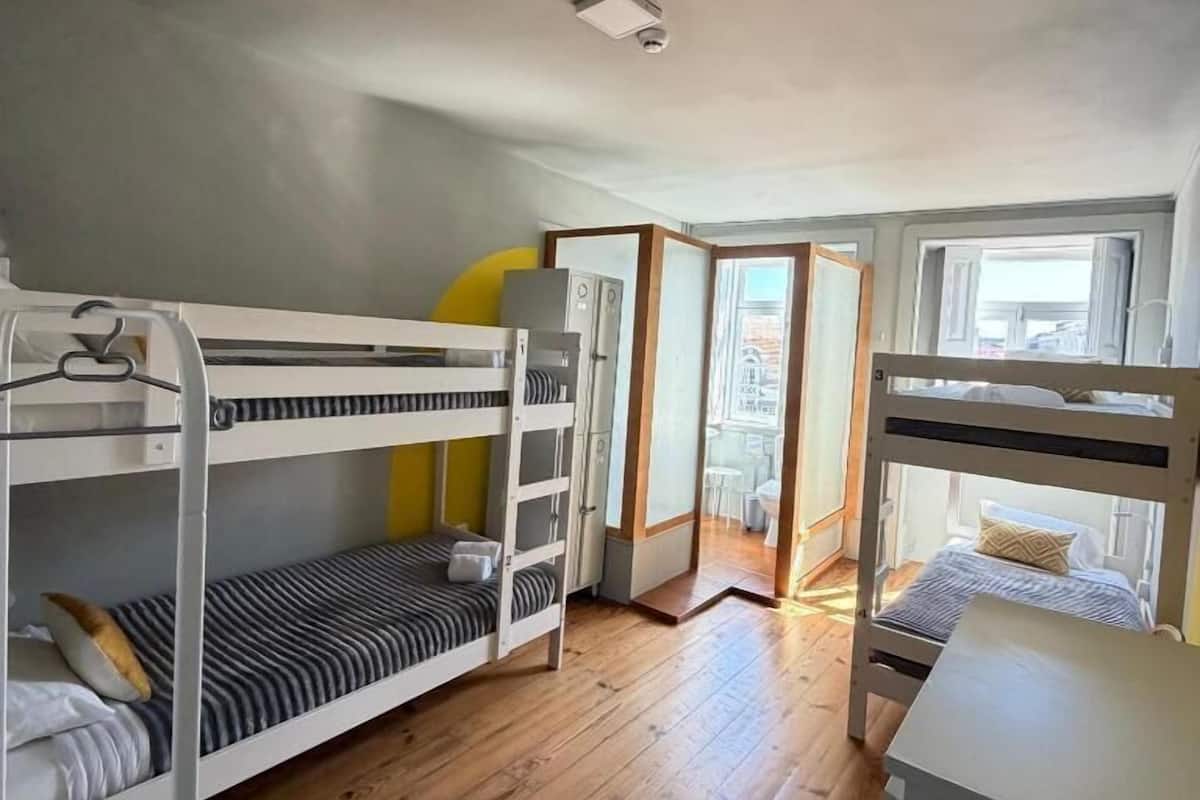 Economy Quadruple Room, Multiple Beds, Private Bathroom | Free WiFi, bed sheets