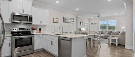 Coffee/tea maker, fridge, microwave, oven