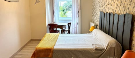 Desk, free WiFi, bed sheets