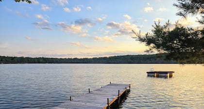 NEW!! Sandy Lakefront Cabin – Sleeps 10 with Kayaks & ATV Access