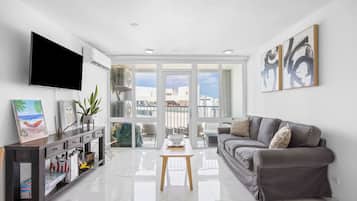 Studio | Living area | 32-inch flat-screen TV with cable channels