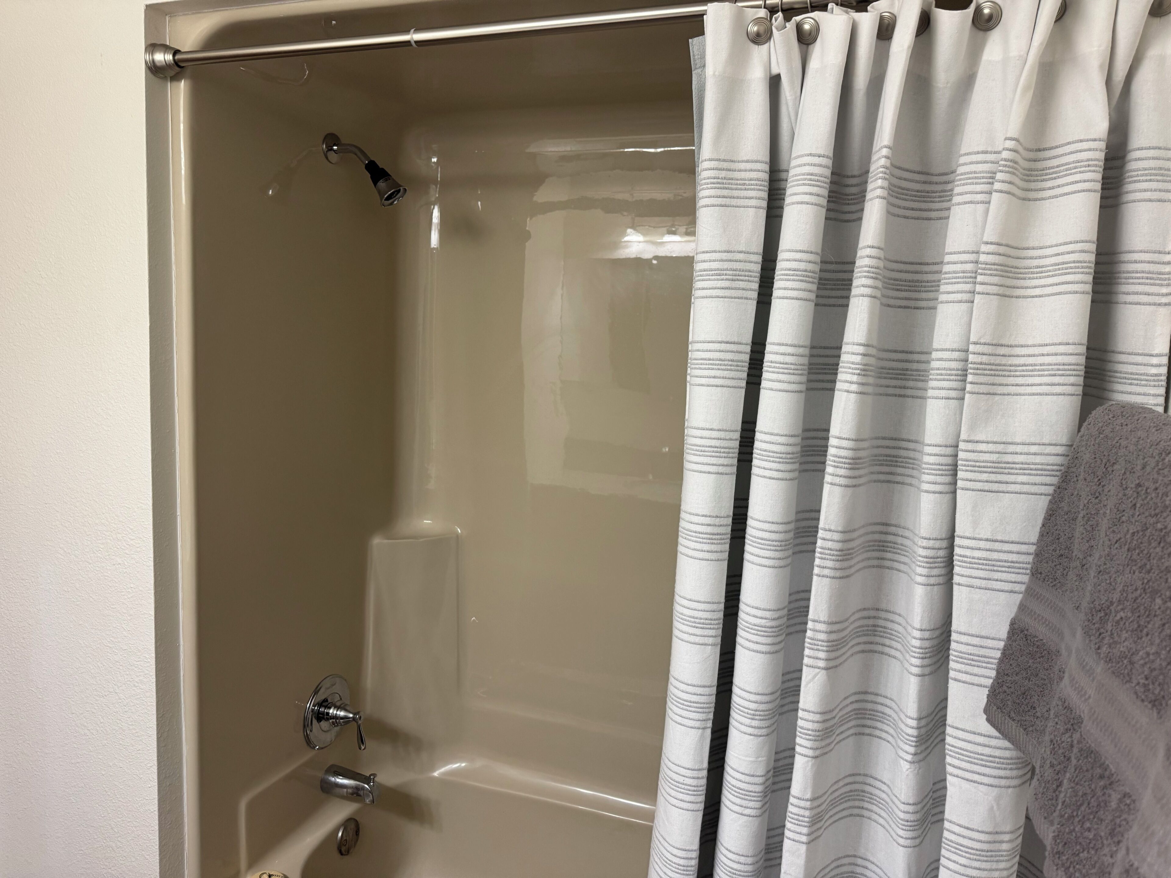 Shower, towels, toilet paper