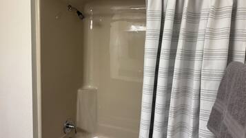 Shower, towels, toilet paper