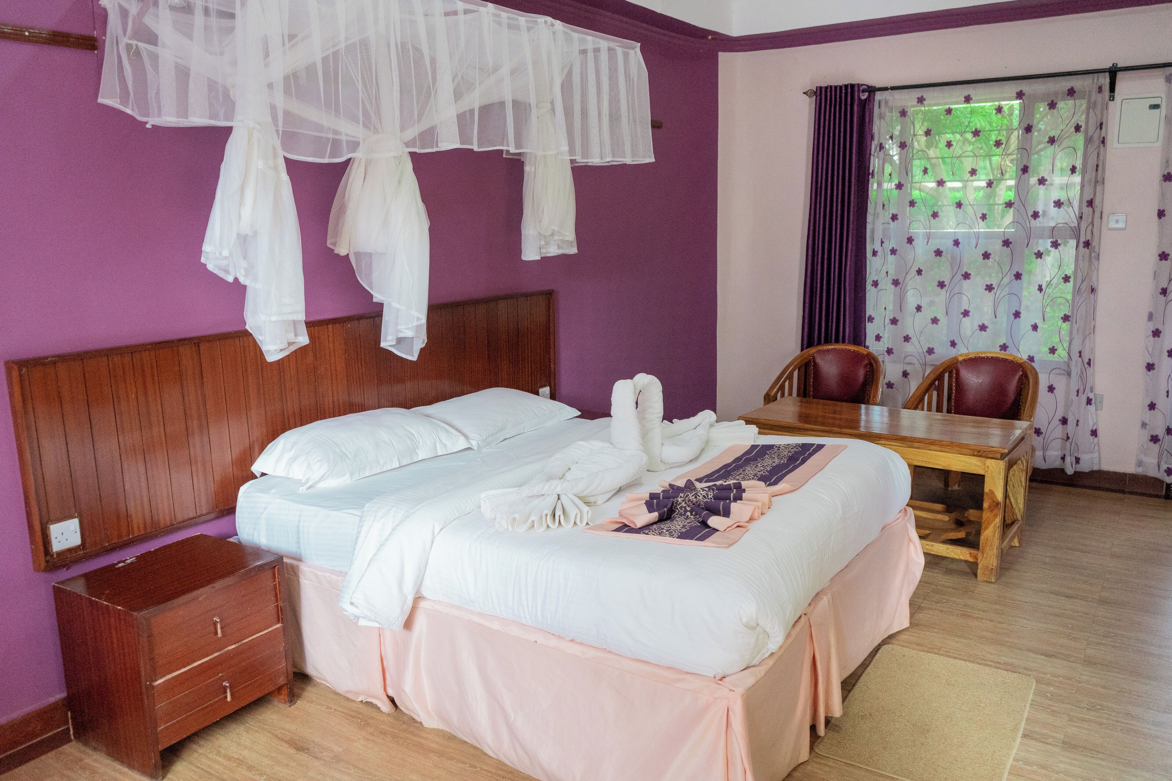 Deluxe Double Room, Patio | In-room safe, desk, laptop workspace, blackout drapes