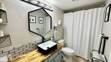 Hair dryer, towels, soap, shampoo
