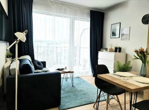 Luxe penthouse, patio | Woonruimte