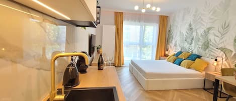 Suite estudio Deluxe, patio, vista a la ciudad | Espacio para trabajar con laptop y wifi gratis