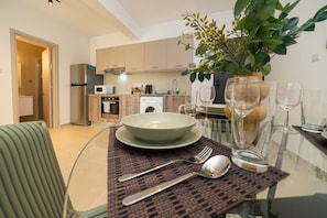 A modern kitchen with cabinets, a microwave, and a dishwasher.