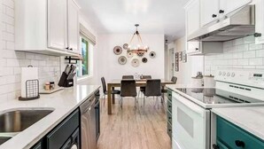 Coffee/tea maker, fridge, microwave, oven