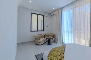 Kamar, balkon, pemandangan kebun | Tirai kedap cahaya, setrika/meja setrika, dan Wi-Fi gratis