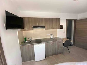Fridge, cookware/dishes/utensils, dining tables - Modern studio in historic center, near beach, view (Limassol)