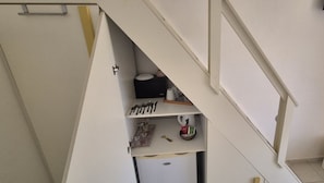 A narrow, white staircase leading to a small kitchen area with basic amenities. - Bicorna Chania Pool Escape - Yellow Room 1 (Apokoronas)