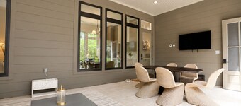 Modern 2 bedroom cottage on 250 private acres with wood-fire hot tubs.