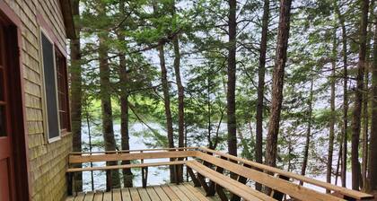 Gorgeous primitive 3-bedroom cabin on Craig Pond, perfect for family adventures