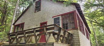 Gorgeous primitive 3-bedroom cabin on Craig Pond, perfect for family adventures