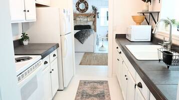 Coffee/tea maker, fridge, microwave, spices