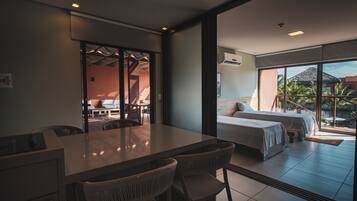 Deluxe Apartment, Pool View | Desk, laptop workspace