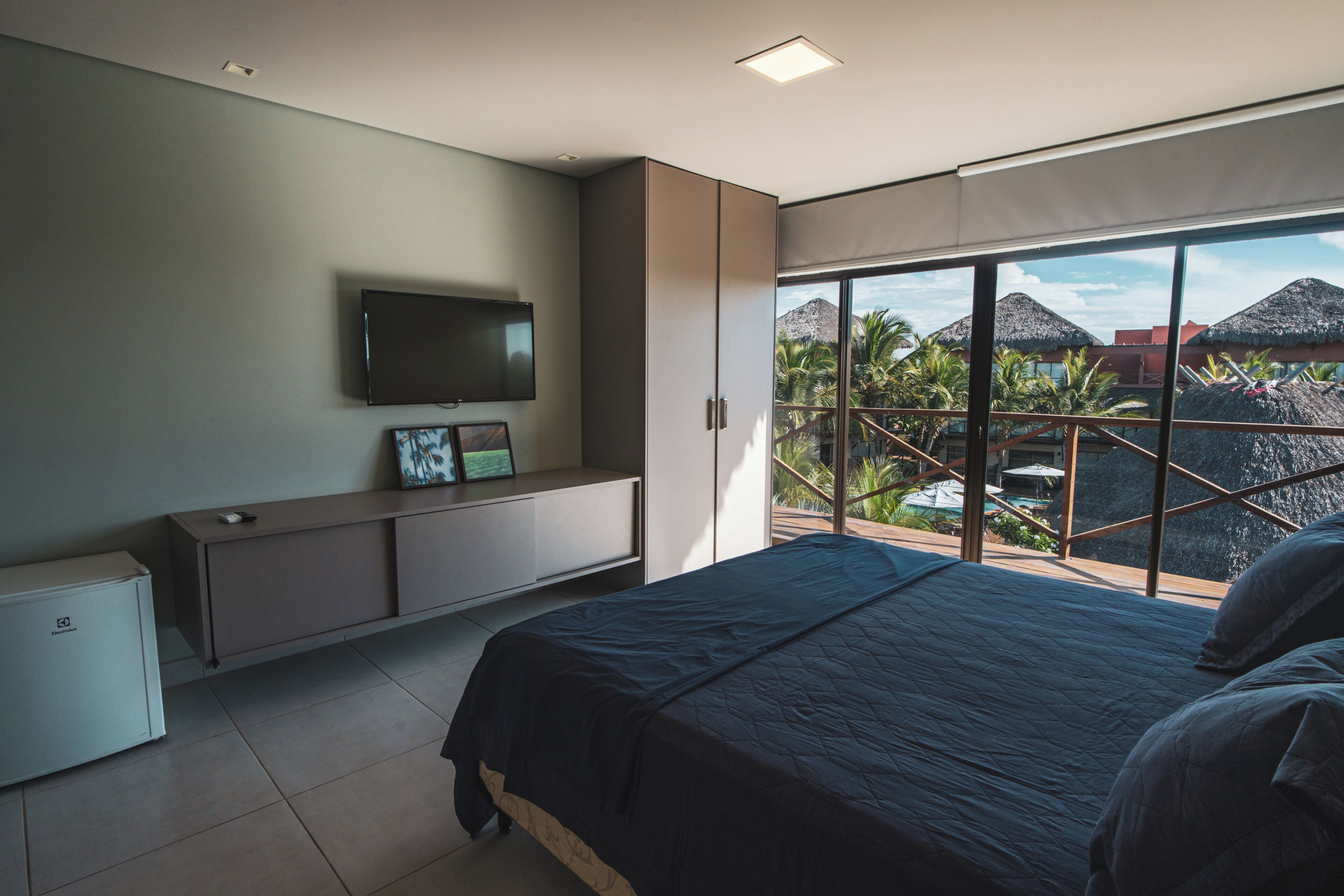 Deluxe Apartment, Pool View | Desk, laptop workspace