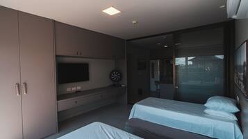Deluxe Apartment, Pool View | Desk, laptop workspace
