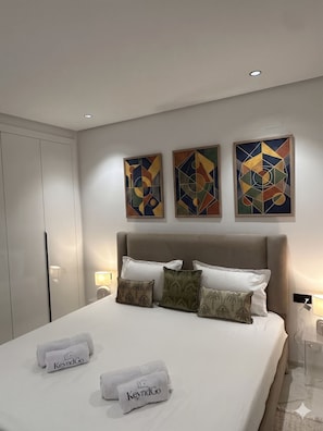 Deluxe Apartment, Courtyard View | Laptop workspace, blackout drapes, free WiFi