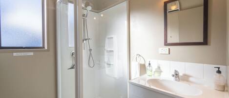 Shower, hair dryer, towels, soap