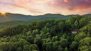 A forested mountain landscape with a cabin. - A View For Two | Ellijay, GA (Gilmer County)