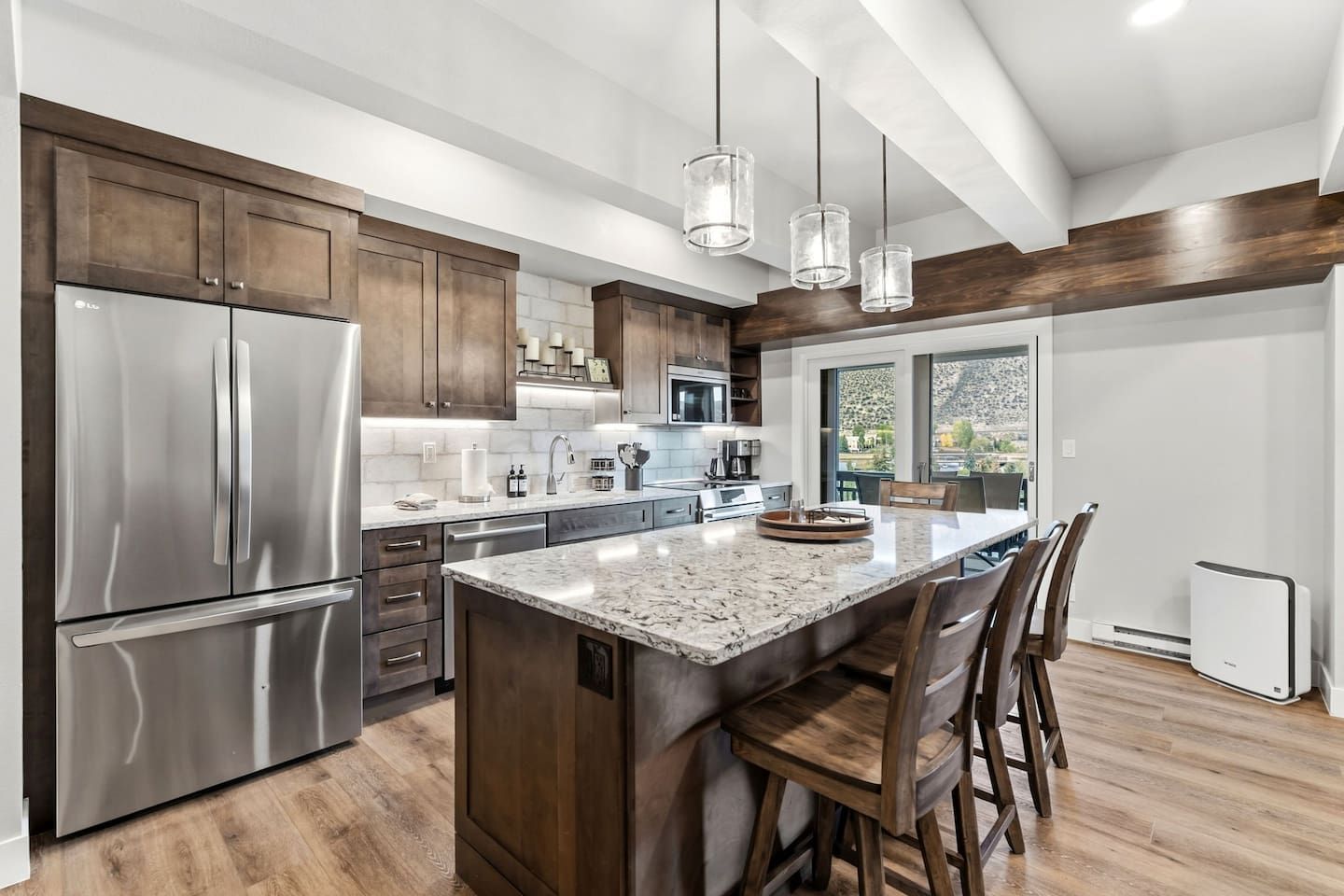 Modern fully equipped kitchen with a large island and breakfast bar
