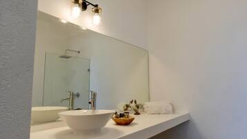 Shower, towels, soap, toilet paper