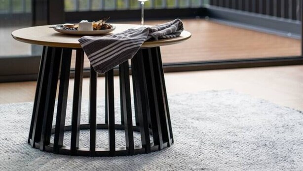 A round table with a glass of white wine, a striped napkin, and a plate of food on a balcony with a view of a mountainous landscape. - Mosswood - Breath Quiet Hideaways, Hobart (Fern Tree)