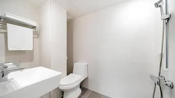 Standard Double Room | Bathroom | Shower, hair dryer, towels, soap