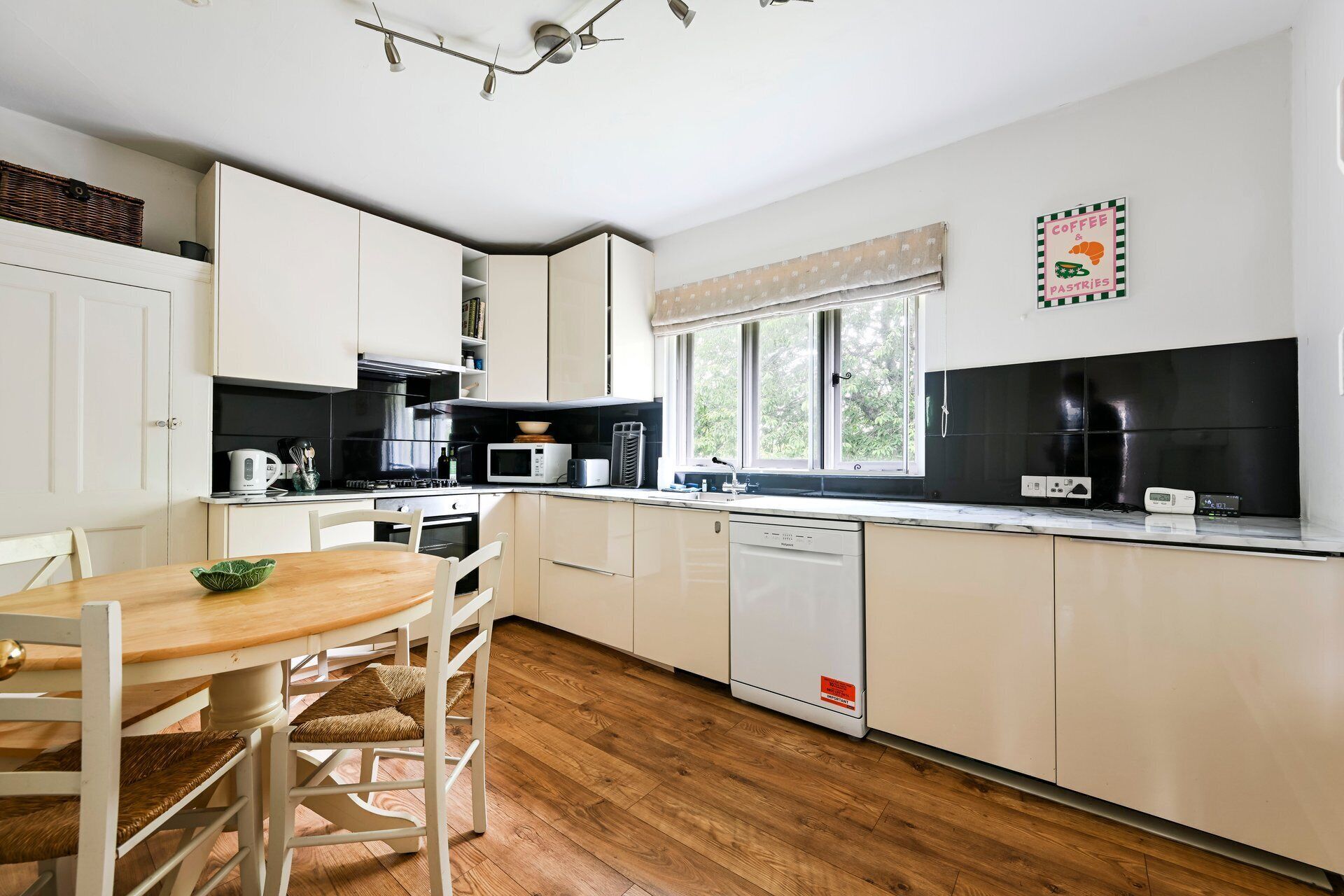 Coffee/tea maker, fridge, microwave, oven