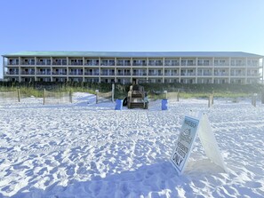 A beachfront hotel with a sign indicating it is a private beach for residents and guests only. - Beach Front Paradise/Unobstructed Gulf View From Private Balcony/Pool (Destin)