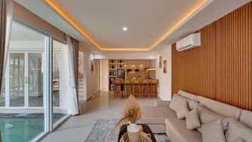 Villa, Balcony, Pool View | Living room | 55-inch Smart TV with digital channels, Netflix, streaming services