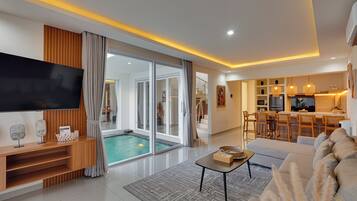 Villa, Balcony, Pool View | Living room | 55-inch Smart TV with digital channels, Netflix, streaming services