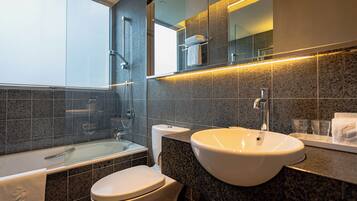 Shower, hair dryer, slippers, towels
