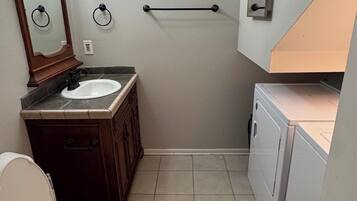 Hair dryer, towels, soap, toilet paper