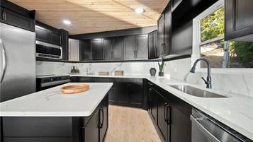 Coffee/tea maker, fridge, microwave, oven