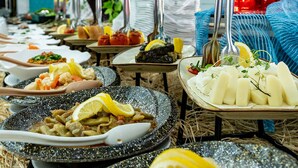 A buffet with various dishes and utensils. - La Benata Beach Hotel (Manavgat)
